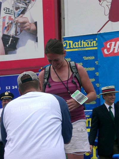 What says romance like a marriage proposal before Nathan's Famous Hot Dog Eating Championship?